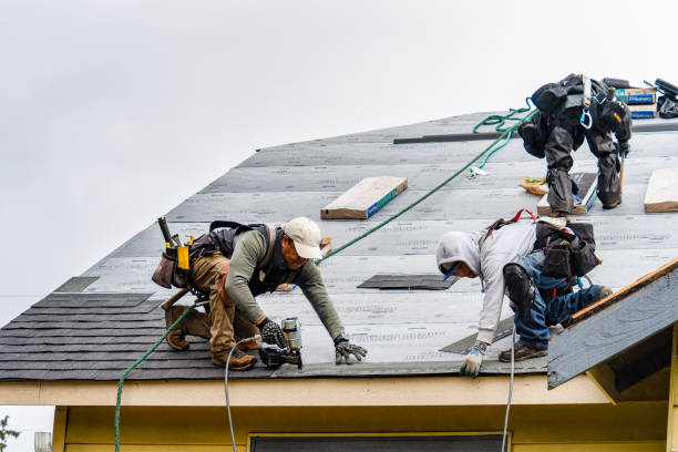 Professional Gutter Installation technician working in Massena, IA